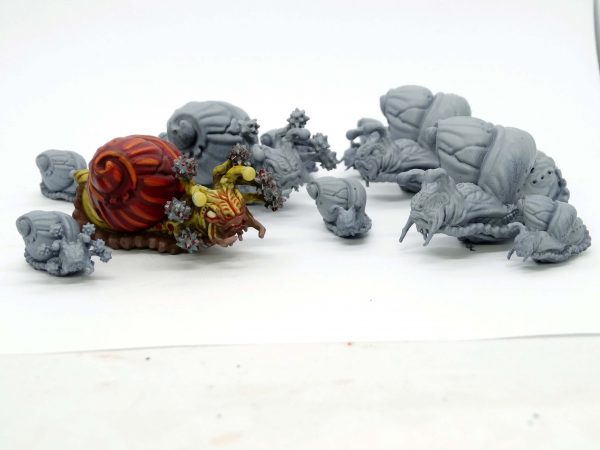 Giant snails and flail snail resin minis from Mystic Pigeon Gaming